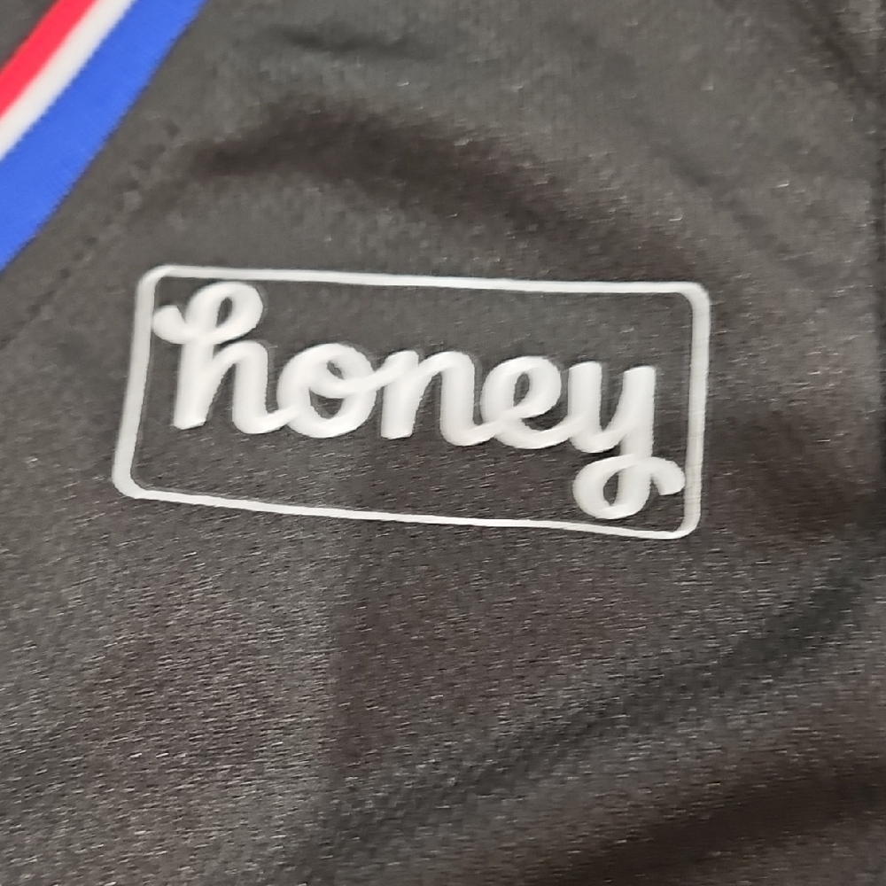 Kids Black Basketball Jersey with Red and Blue Accents - Picture 4 of 7